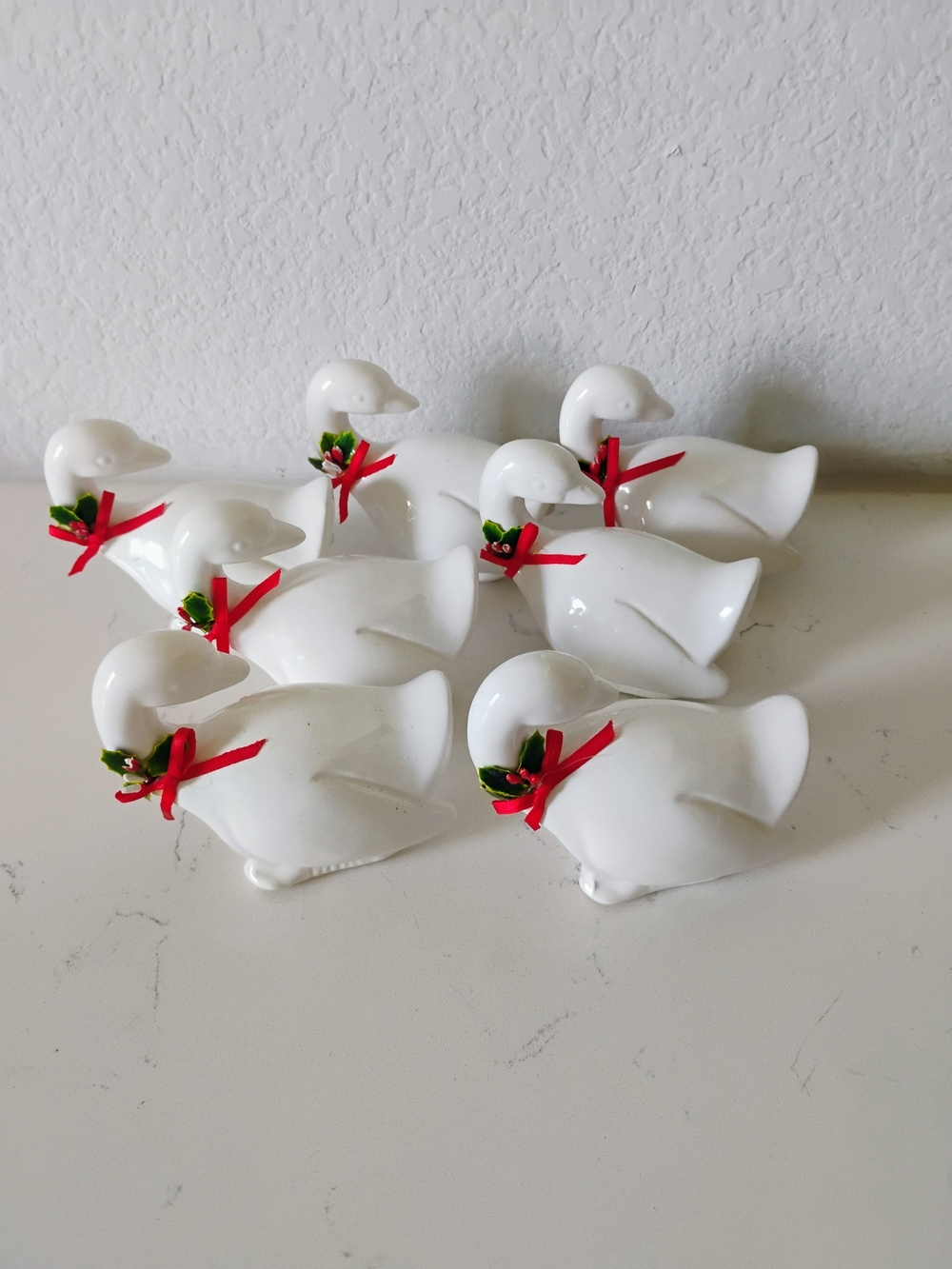 White Ceramic Duck Figurines with Red Holiday Ribbon - Set of 6